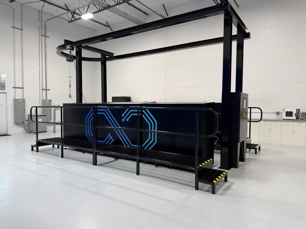Infinium Edge immersion cooling tank at the Innovation Center — Edge Thermal Vectoring™ platform